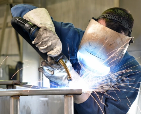 a worker performing welding task