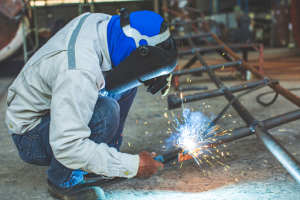 a factory worker doing welding