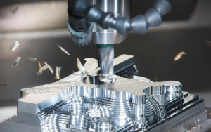 An industrial CNC machine operates to cut metal