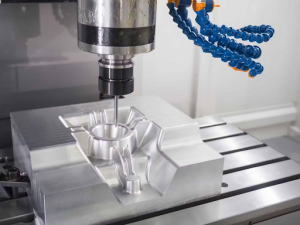 A machine fabricates a metal part in a busy machine shop, showcasing industrial equipment and tools. 