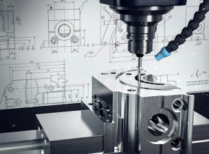 A CNC milling machine operates on a blueprint, shaping material with precision and accuracy.