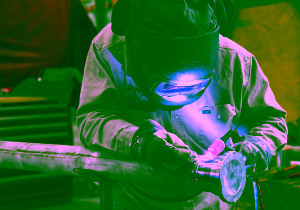 A worker performing welding task
