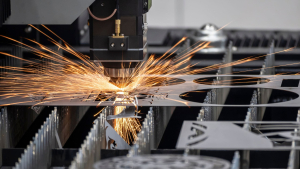 A laser cutting machine cuts through a metal
