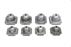 Six metal nesting plugs displayed on a clean white background