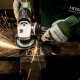 worker using metal welder