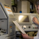 A worker operating CNC Lathe machine