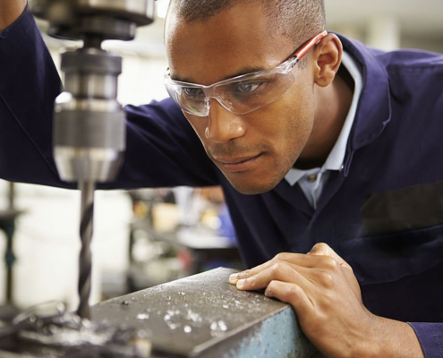 Engineer Using Milling Machine