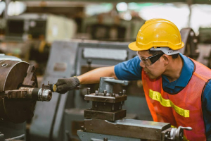 worker operating a machine