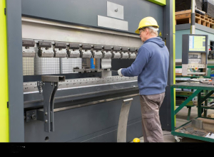 a person using cnc brake machine