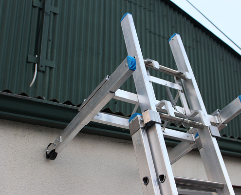 ladder stand off set up on a wall